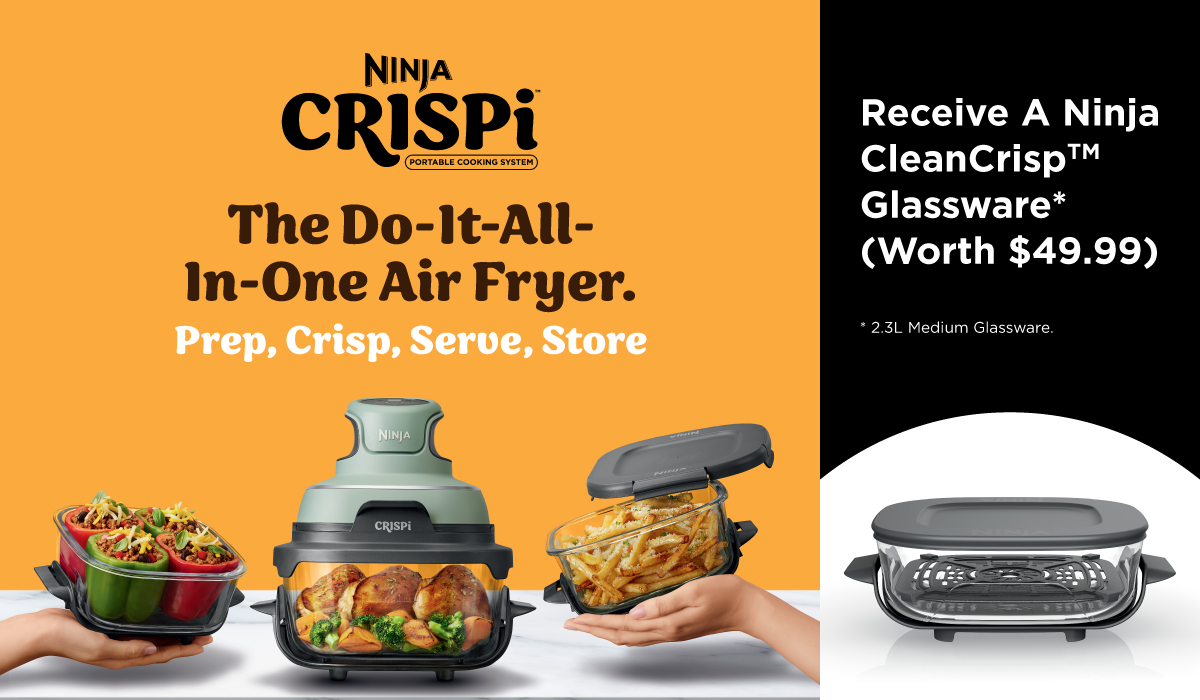 Three women enjoying a shopping day, carrying multiple colorful shopping bags while walking together outdoors.